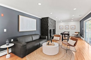 Another seating area in the house, giving your group plenty of space to hang out in. Watch your favorite sports game on the TV in this area, which is equipped with cable and all the apps you could want.