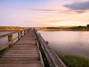 Walk to the beach from the house. Enjoy fishing off the dock or kayaking down the inlet. The water is very calm and there's plenty of space on the beach so that you aren't on top of someone else.