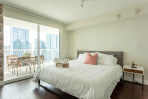 Bedroom with a warm King size bed.