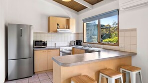 Cooking is made simple thanks to the kitchen's modern equipment and tools.