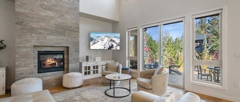 Huge great room with fireplace and TV!