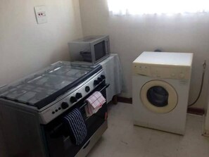 Kitchen + Stove + Washing machine