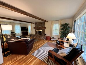 Living room with fireplace and smart TV