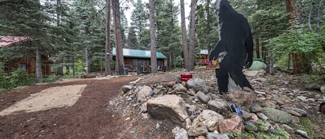 Big Foot waiting to welcome you at the front of the cabin 