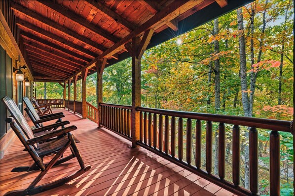 Picture yourself relaxing on the deck with a steaming cup of coffee, breathing deep of the crisp mountain fresh air while watching the sunrise filter through the trees. You deserve this peaceful time away. The front porch is certainly a guest favorite! 