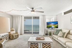 family room with new leather sectional and private balcony