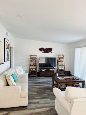 Main level (upstairs) living room w/ pullout couch