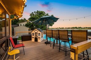 Savor the Colorado sunsets and sunrises over the lake with the mountains framing the view from the balcony and there is a fire pit and playhouse for the kiddos or grandkids!