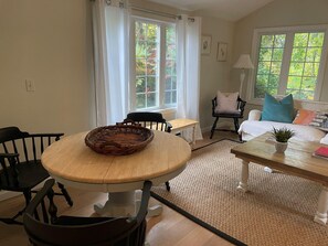 Dining room with extra seating and TV- 6 Captain Morgan- East Sandwich