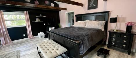 master bedroom king size bed with luxe Vera Wang bedding