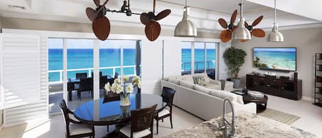 All photos are recent as of January 2023. Great room encompassing the living, dining and kitchen areas with sky-high ocean views. 