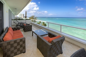 Full furnished expansive private balcony with elevated ocean views. 