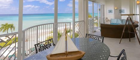 All photos are recent as of January 2023. Fall in love with these beachfront views! Your screened balcony comes furnished with an outdoor dining table and sectional sofa.