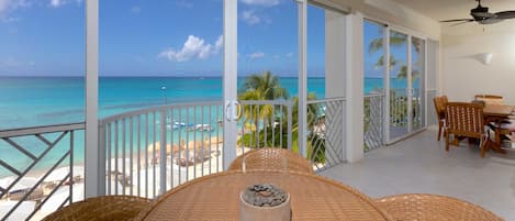 All photos are recent as of January 2023. Enjoy views from this unit's screened balcony overlooking Seven Mile Beach.