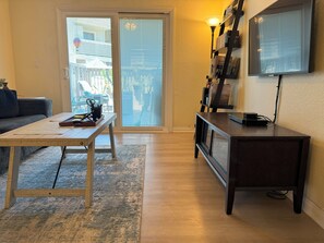 Living Room with Movie Selections and Books