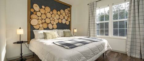 Relax in the king size bed under our custom locally made headboard.