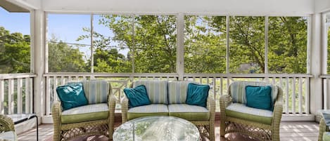 Relax and enjoy on the secluded spacious screened porch on second floor