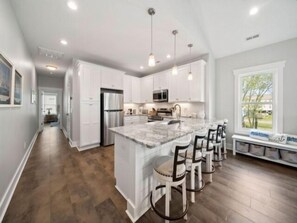 Indoors, Kitchen, Kitchen Island, Dining Room, Dining Table