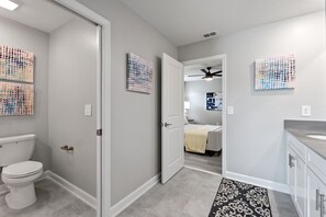 Attached Jack and Jill bathroom with a walk in shower, double sink