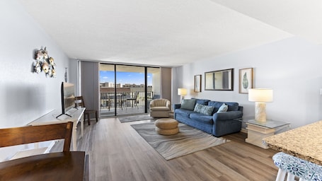 Feel the ocean breeze as you sink into the cozy sofa, sip your morning coffee, or unwind with a movie after a beach day