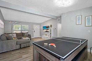 This dining table is more than just a surface for meals, it's a versatile piece of furniture that can provide endless hours of entertainment.