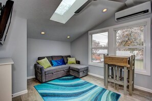 Captivating Living area, pull out full size sofa sleeper, dining table for 2
