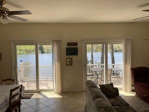 living/dining room looking out to the deck and lake. 