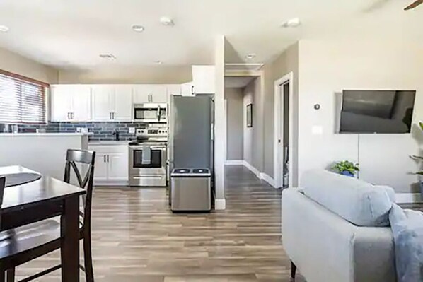 Great view of the living space including hallway to the bedrooms