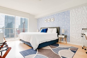 Comfy bedroom space featuring a Queen sized bed