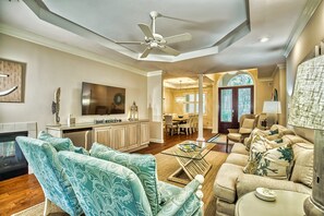 Large sectional couch in family room, big screen TV