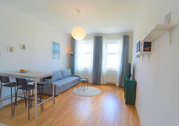 Tiny cute living room with TV for your stay to enjoy !