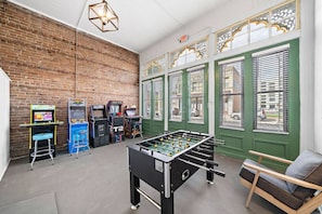 Enjoy this game room with a variety of games
