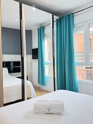 Bedroom 2 - Bedroom has a comfortable double bed with one towel per guest, air conditioning, television and storage space for your belongings.