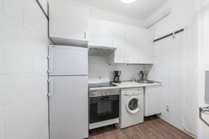 The kitchen is equipped with the main appliances, crockery and other usual utensils.