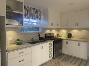 Kitchen with full amenities 