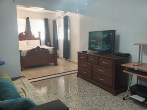 Master bedroom/ Entertainment / smart TV/ sitting area