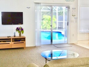 Access to the pool area is available from the living space