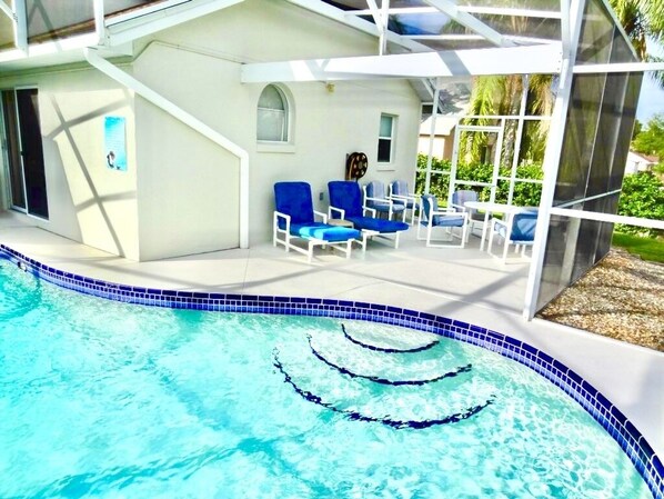 The pool area has outside seating perfect for relaxing in the sun