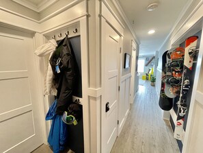 Coat and gear storage, ski/snowboard rack.  