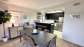 Kitchen and dining room with breakfast bar