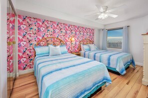 Flamingo Room offers 2 comfortable full beds, smart TV & sound machine.