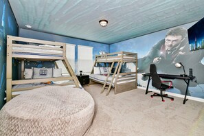 Enjoy the flexibility and comfort of our Harry Potter Themed room with four beds, providing you with a cozy and restful retreat during your stay."