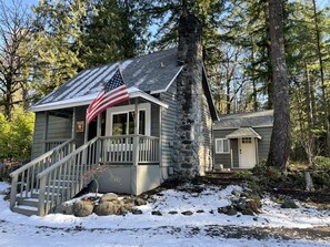 FRONT OF COTTAGE and BUNKHOUSE IN BACKGROUND