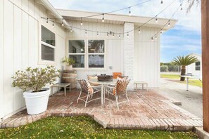 Adorable patio, we love to sip wine here!