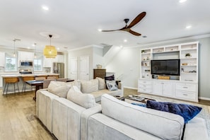 Spacious open concept layout of the living area and kitchen