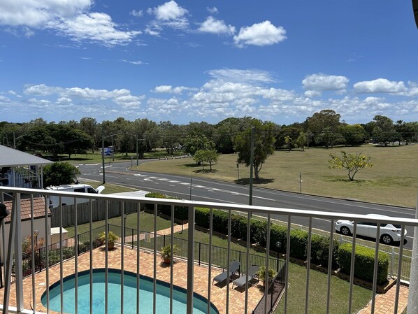Balcony overlooking pool