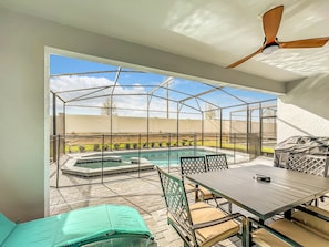 - Relax in the shade with ceiling fan breezes and an inviting dining setup for outdoor meals
- Private screened in pool and spa area offers a peaceful oasis for family fun or solo dips
- Lounge chairs and BBQ grill complete your sunny escape setup