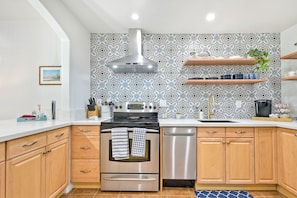 Fully remodeled kitchen with modern amenities.