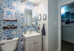 Sleek and spotless bathroom with contemporary fixtures for a spa-like feel