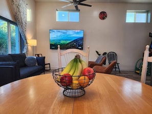 The large dining table fits four and expands to accommodate six or provide more space for puzzling.